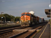 BNSF 6919 takes a mixed freight through Congress Park station