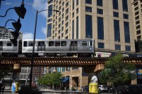 An Orange Line train takes the S-curve over 12th Street on the way to the Loop