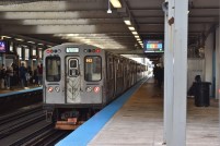 A Green Line train stops at Clark/Lake