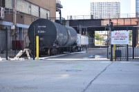 Across the street from high-rises, the Blommer Chocolate Company factory's spur makes up part of the tangle of tracks leading out of Union Station and OTC