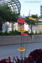 Plexiglass flowers adorn the streetscape on South Wacker