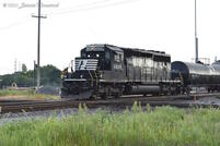 An Admiral Cab SD40-2 shuffles across the diamond with a switch job