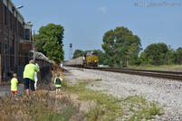 With the westbound cleared up and the CN train awaiting clearance, the last eastbound Roadrailer approaches the gathering of railfans at WABIC crossing