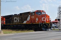 In the time it took to load my gear up, the CN train made it across the diamond and to the crossing on Eldorado Street