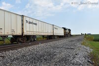 256 slows as it approaches the end of Sloan siding for a meet with a westbound