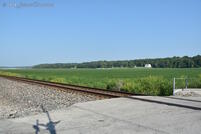 More farm fields line the railroad at Paw Paw Pike just east of Peru