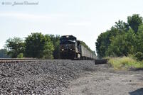 The final run west rides high on the embankment
